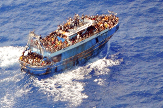 2023-07-10T153652Z_1022449563_RC25J1A2F5A8_RTRMADP_3_EUROPE-MIGRANTS-GREECE.jpg