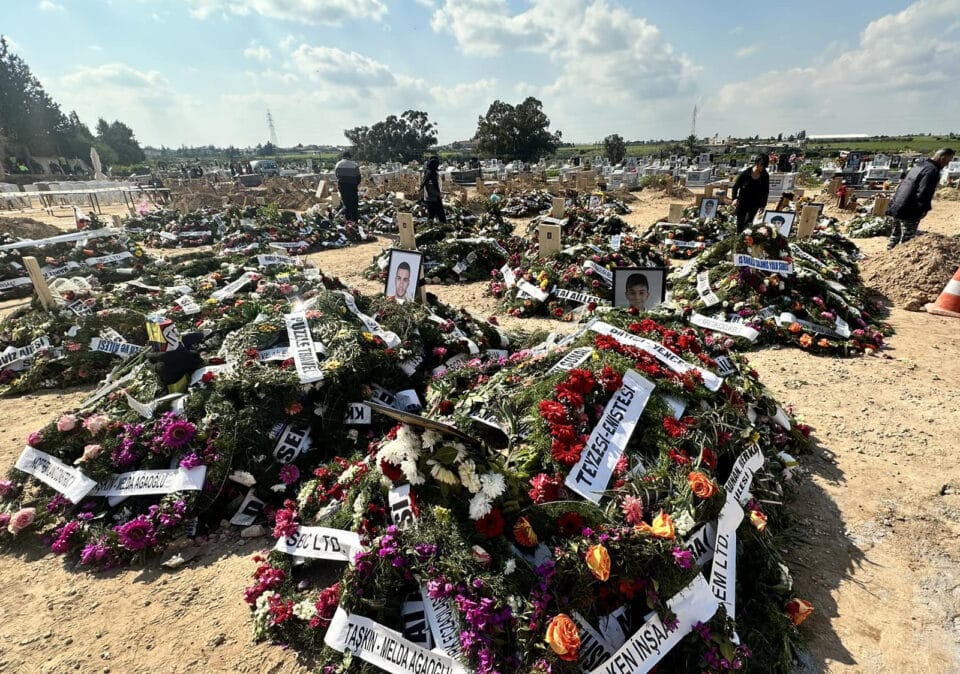 Flowers-on-the-graves-of-the-children-who-died-in-the-earthquake-960x674.jpg