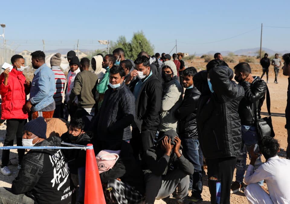 Migrants-gather-outside-the-Kokkinotrimithia-refugee-camp-on-the-outskirts-of-Nicosia-960x676.jpg