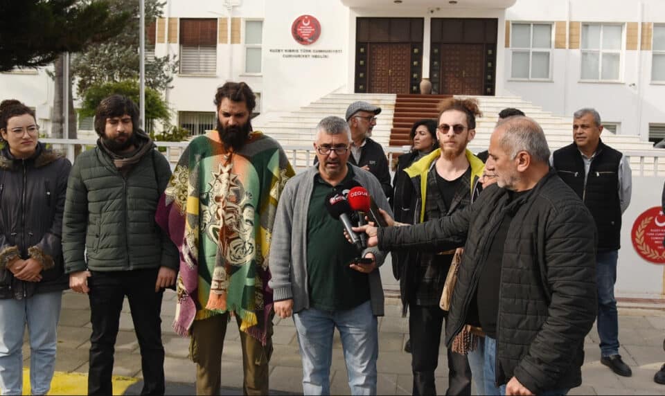 mustafa-with-supporters-outside-the-court-in-the-north-960x572.jpg