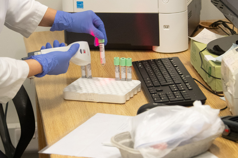 web-covid-19-test-sample-nurse-cyprus.jpg