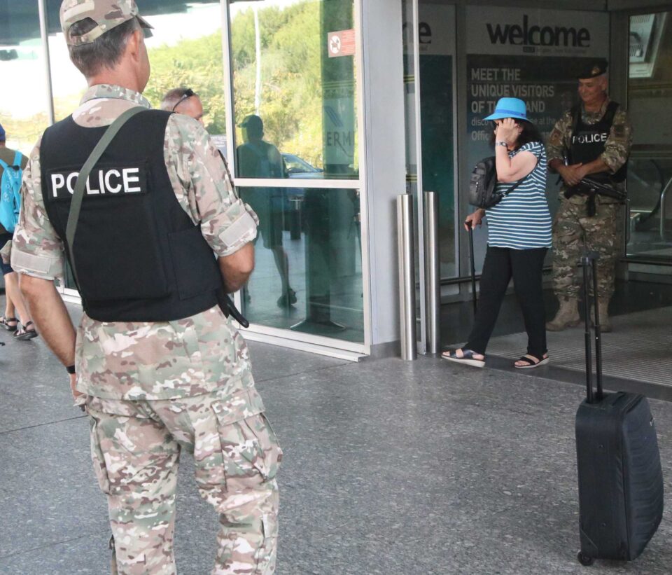 A-police-officer-on-guard-at-Larnaca-airport-on-Monday-960x821.jpg