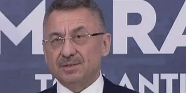 Fuat-Oktay-deleivering-his-opening-speech-at-the-round-table-discussion-in-Varosha.jpg